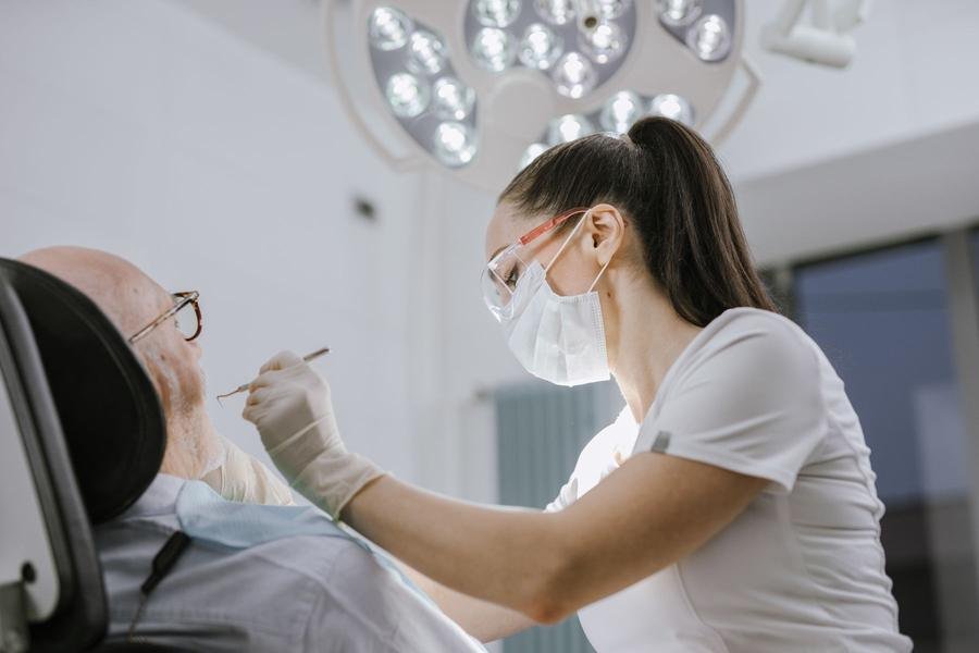 Dentist treating a patient in a modern dental practice