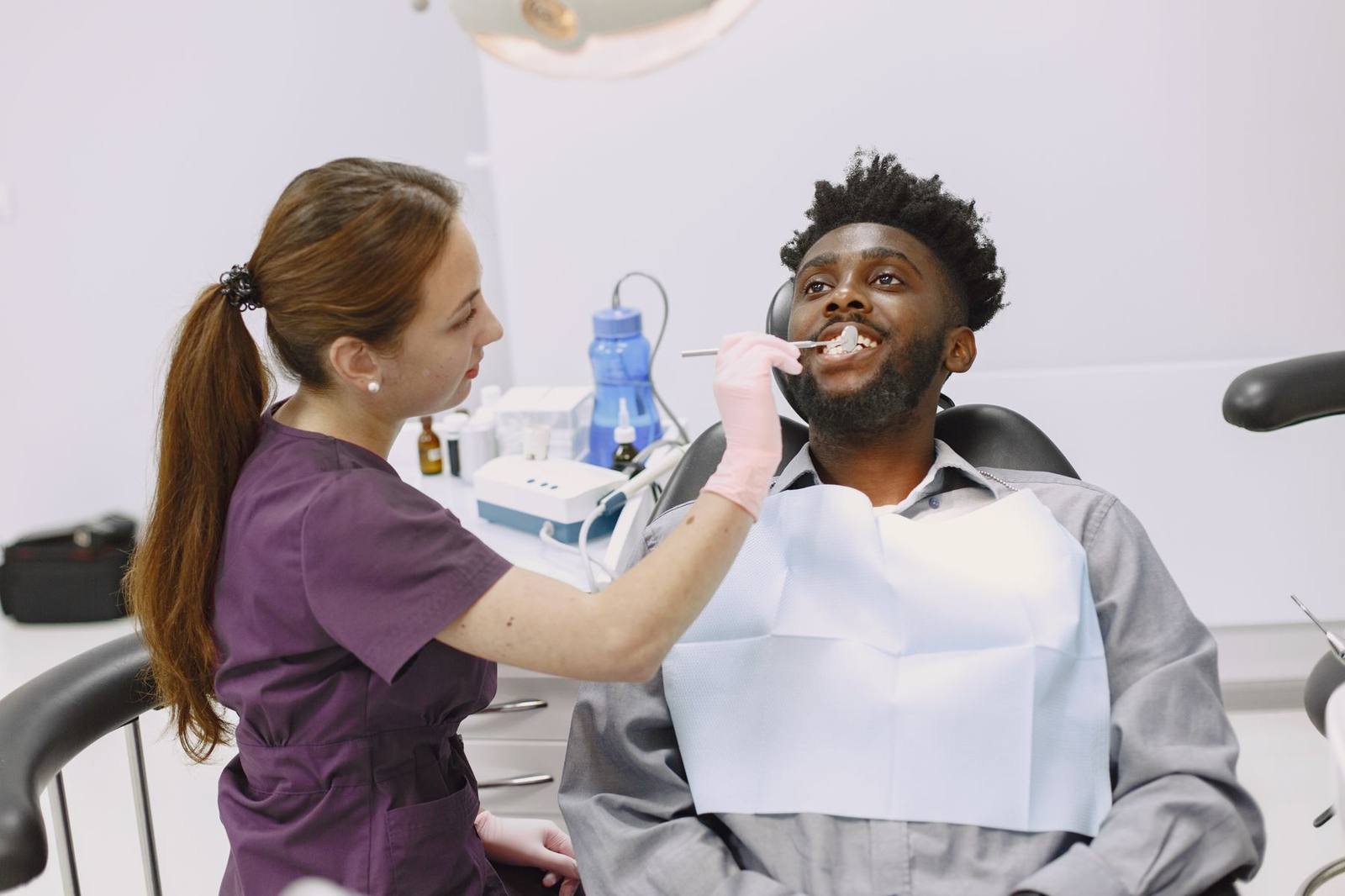 Smiling UK dental practice team in a modern clinic