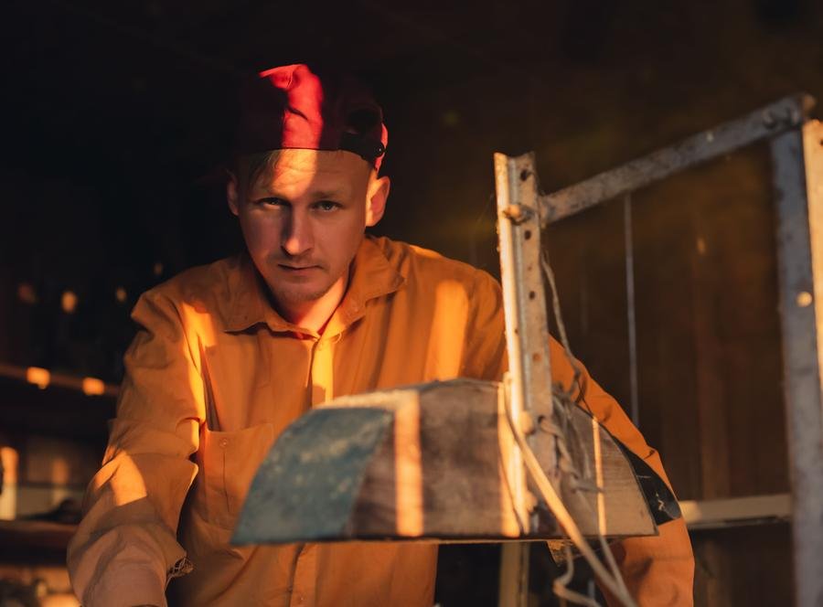 Experienced UK carpenter in his woodwork workshop