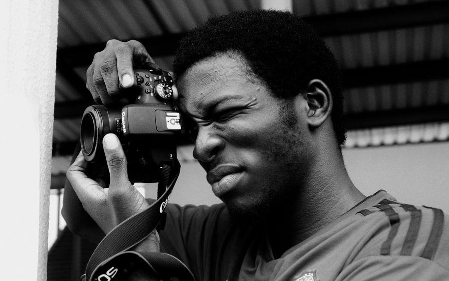 UK portrait photographer composing a shot on a Canon