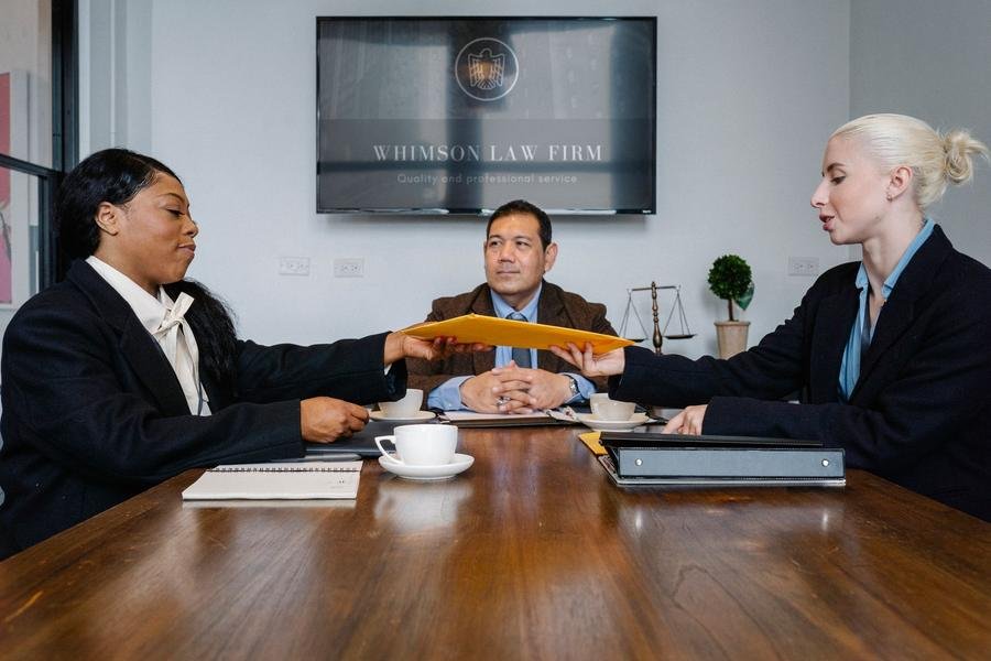 UK legal team meeting around a law firm conference table
